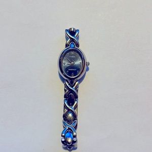 Timex blue face watch with XO bracelet style band